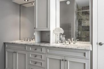 Light gray bathroom cabinets and bathroom remodeling in South Florida