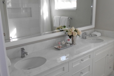 White bathroom with two sinks