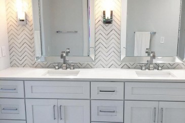 Custom herringbone tile look on wall for bathroom remodeling in Kendall, FL