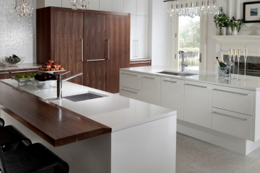 Custom kitchen cabinets in Coral Gables with white and wood accents